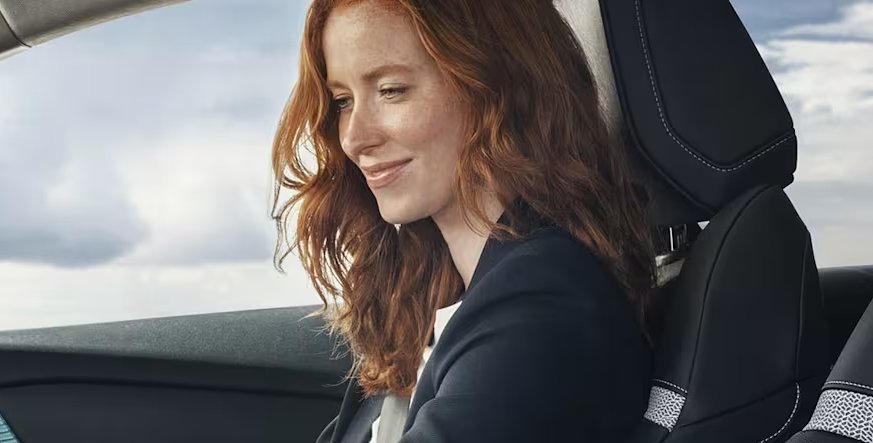 woman sat in a car