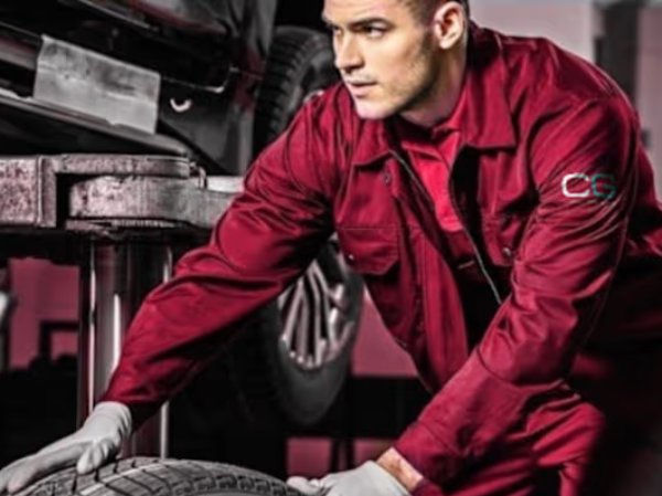 man wheeling a wheel to the car