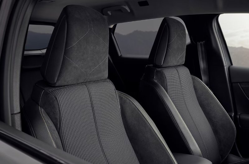pan shot of the front two seats in car