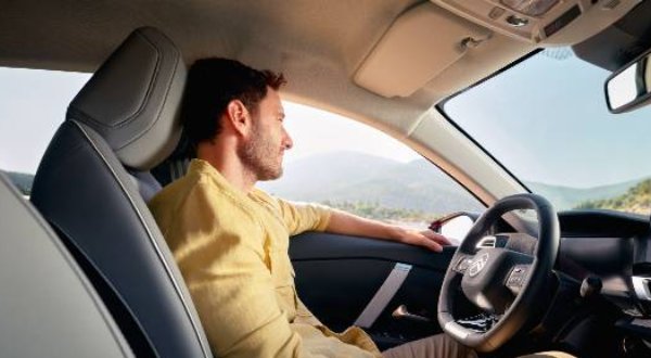 man sat in the car