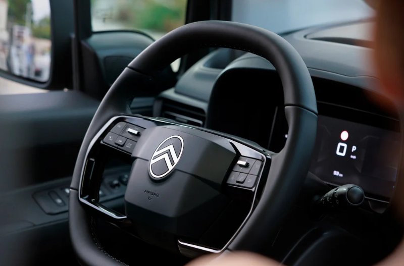 close up of the steering wheel and dashboard