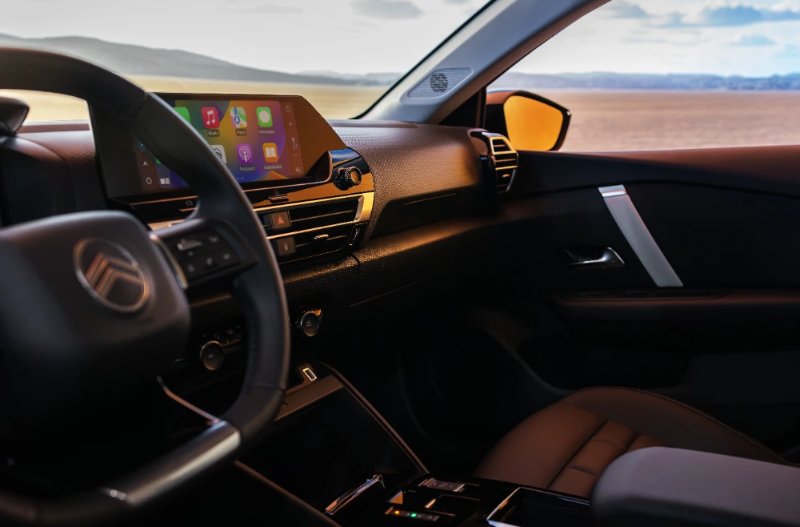 close up of th car dashboard from the wheel side