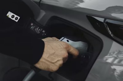Person putting car on charge