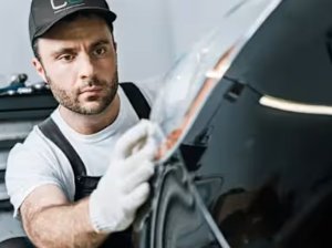 man at the front of the car