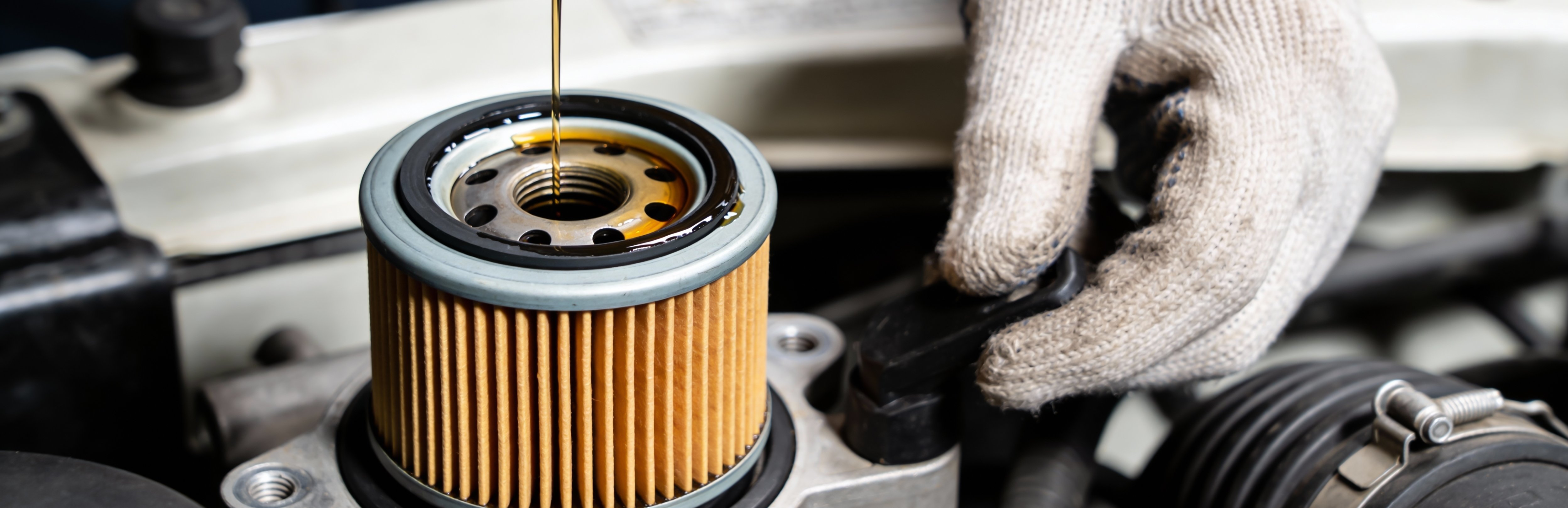 oil being poured into engine