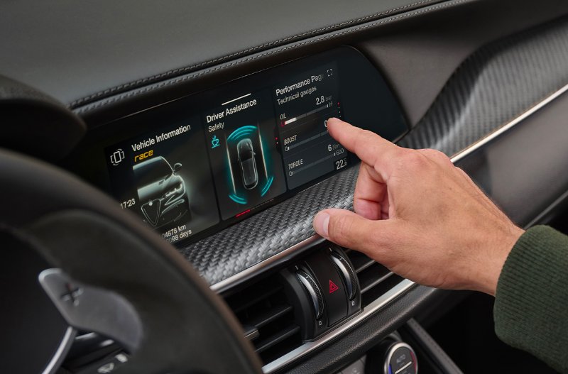 Close up of someones hand in the car
